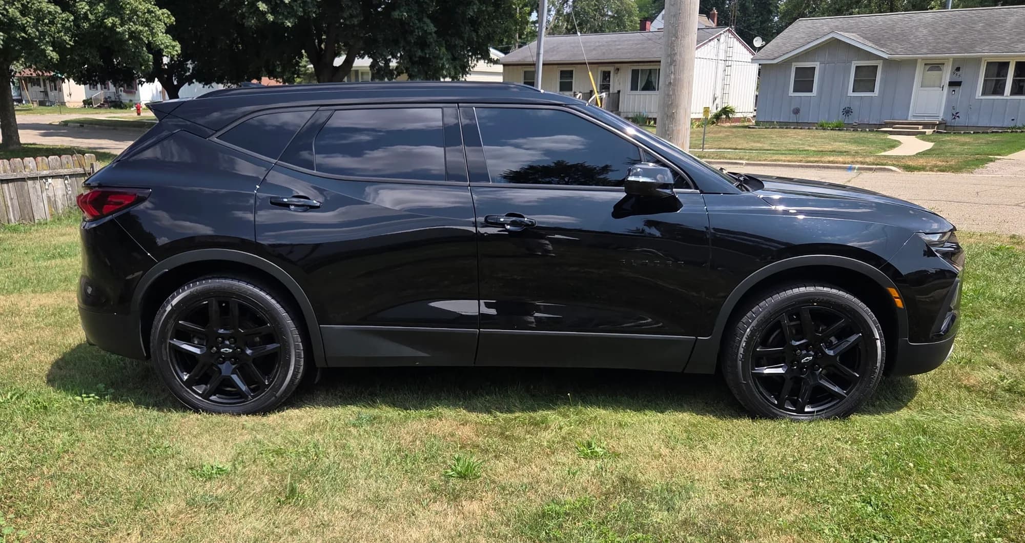 Black Chevrolet Blazer gleaming after a ceramic coating