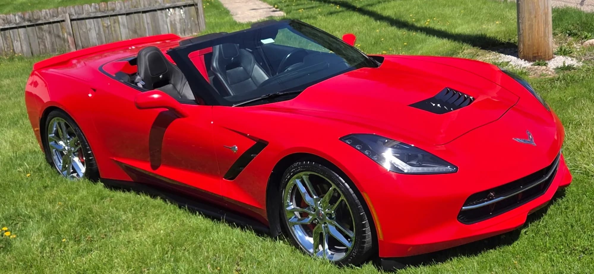 Red Corvette Stingray with a mirror-gloss ceramic coated finish