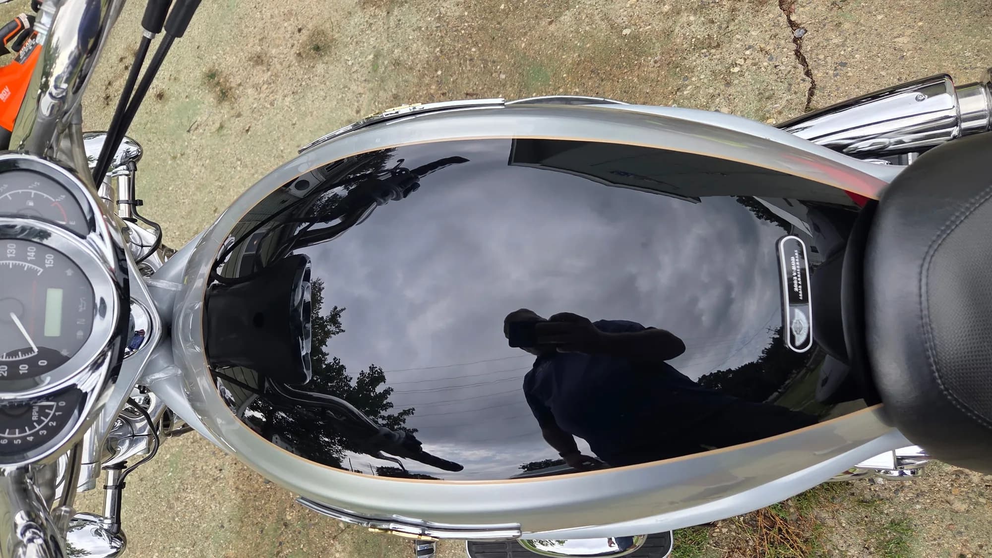 Harley-Davidson fuel tank so glossy the sky reflects in it after ceramic coating