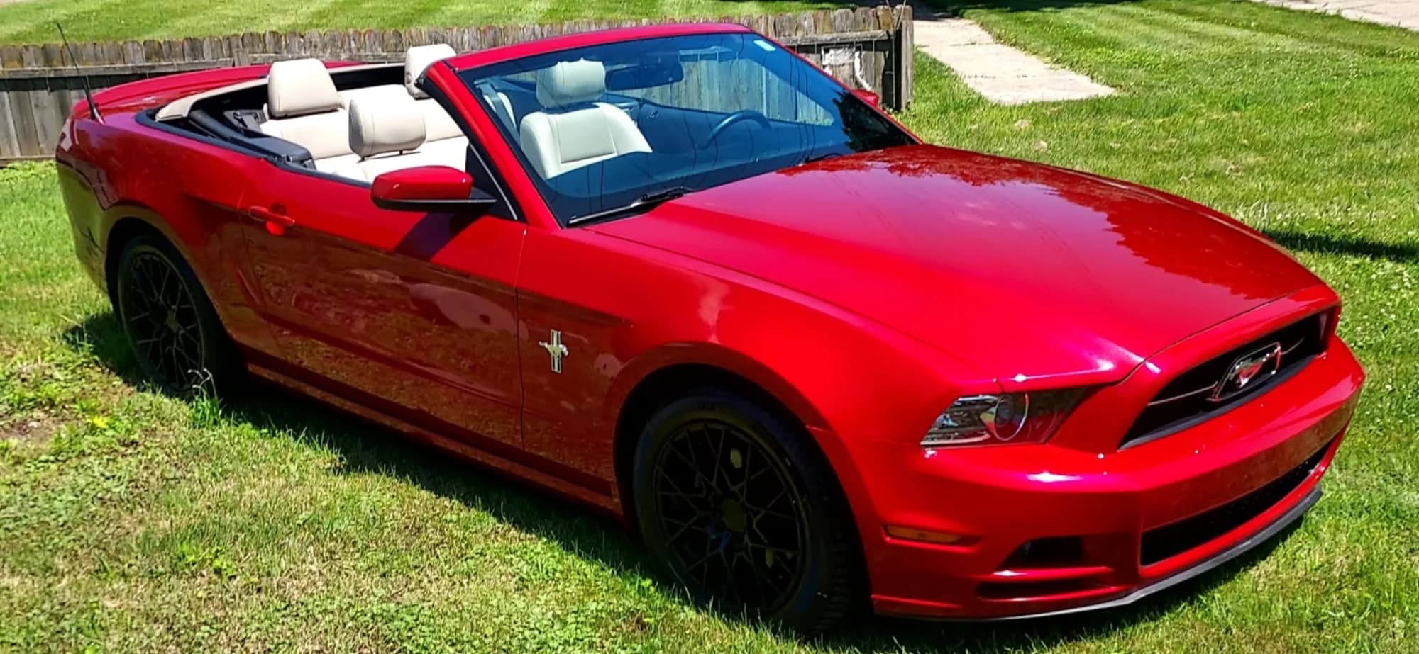 Red Ford Mustang convertible with a fresh ceramic coating